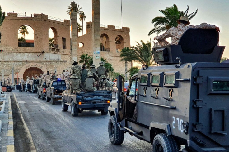 Vehicles of the "Tripoli Brigade", a militia loyal to the GNA, parade on July 10 through Martyrs' Square at the centre of the capital Tripoli