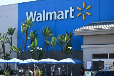 Walmart reported strong earnings behind higher sales at US stores, with consumers shopping less frequently, but spending more at each visit