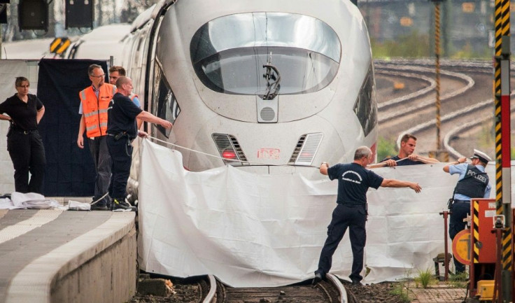 The suspect is accused of pushing the eight-year-old boy and his mother onto the tracks in an apparently random attack at Frankfurt's main station last year
