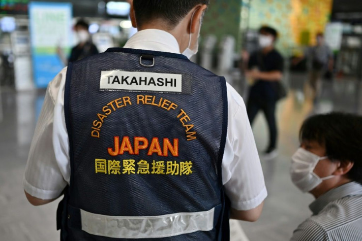 Six members of the specialist clean-up team are travelling to Mauritius from Japan