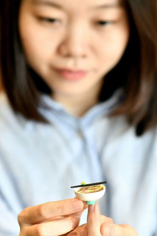 Artist Nguyen Thi Ha An sells her miniature food models for up to $80 each