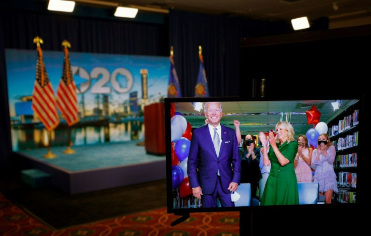 US Democratic presidential candidate and former Vice President Joe Biden reacts with his family after being formally nominated as the Democratic presidential candidate