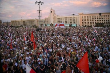 Thousands rallied in central Minsk waving the red-and-white flags of the opposition and calling on Lukashenko to step down