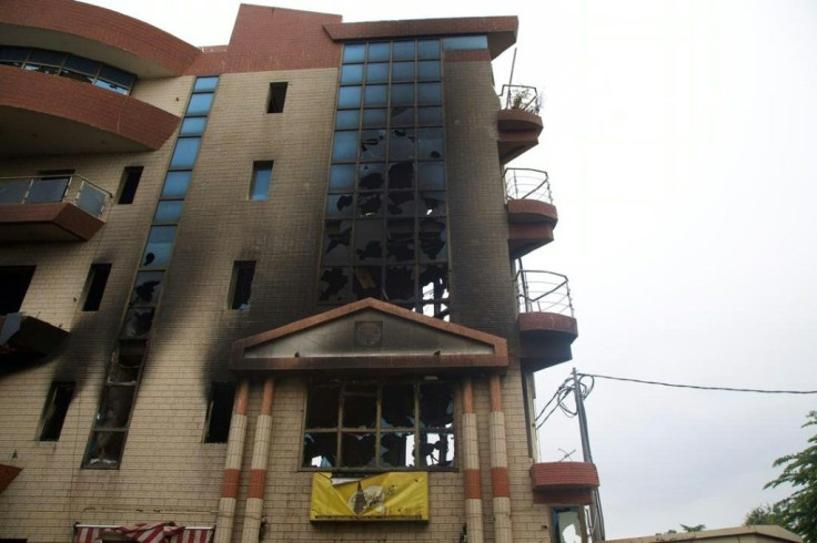 The burnt-out home of the former justice minister after an attack by protesters was one of the few visible signs of the overthrow