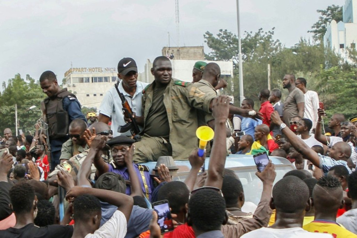 Jubilant crowds cheered the rebels as they arrived in central Bamkako on Tuesday