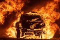 A car burns while parked at a residence in Vacaville, California during the LNU Lightning Complex fire on August 19, 2020