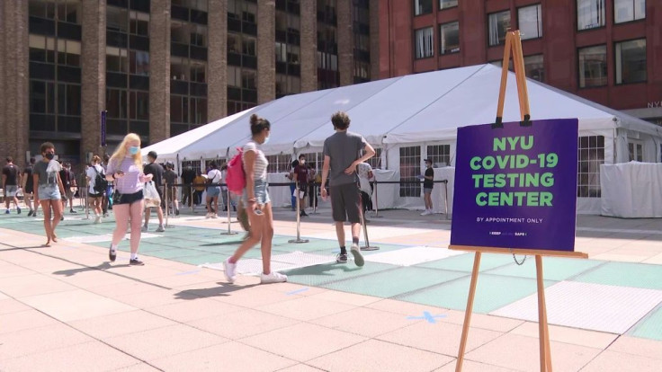 Students line up to get tested on the campus of New York University, a mandatory step to be able to go back to in person classes on September 2. A quarantine is also required.