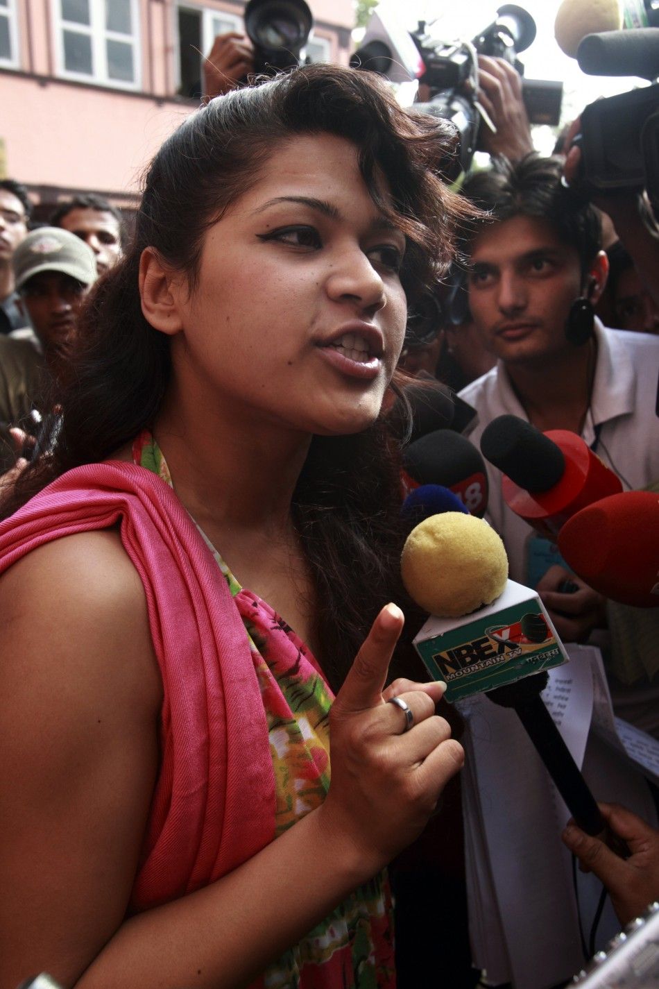 Nihita Biswas, who claims to be the wife of French serial killer Charles Sobhraj, talks to the media as she leaves the Supreme Court in Kathmandu