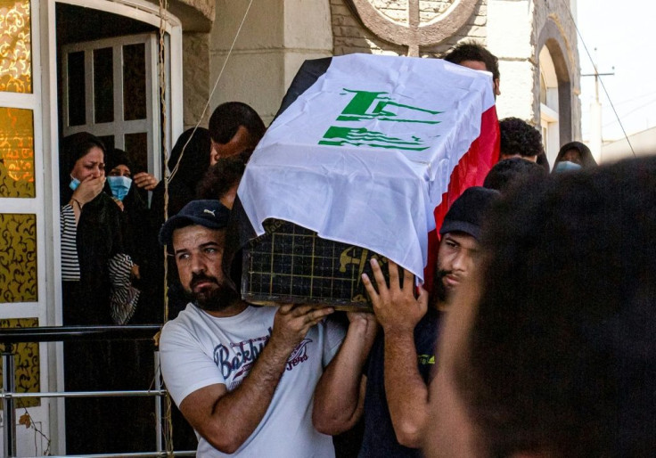Mourners carry Yaaqub's coffin during her funeral on Thursday