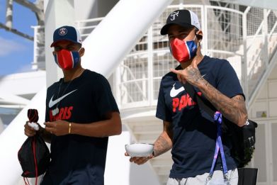 Paris Saint-Germain's Brazilian stars Neymar and Thiago Silva leaving the team's hotel in Lisbon on Friday, two days before the French club face Bayern Munich in the Champions League final