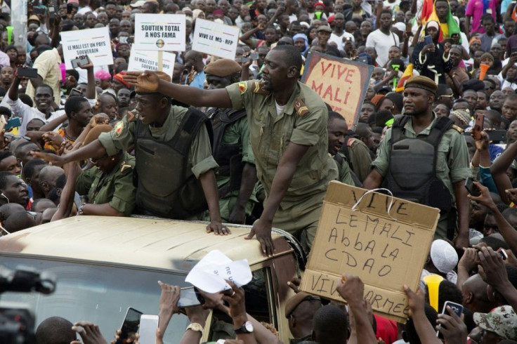Malian demonstrators on Friday hailed soldiers for the military overthrow of President Ibrahim Boubacar Keita