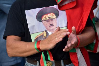 An admirer shows support for President Lukashenko, who vowed to "protect the territorial integrity of our country" ahead of a major rally which the opposition has called for Sunday