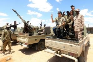 Libya's rival administrations have announced a ceasefire but analysts warn it is only the start of a long path to peace