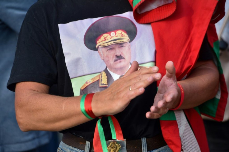 An admirer shows support for President Lukashenko ahead of a major opposition rally set for Sunday