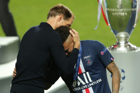 Paris Saint-Germain coach Thomas Tuchel consoles Neymar after the French side lost to Bayern Munich in Sunday's Champions League final