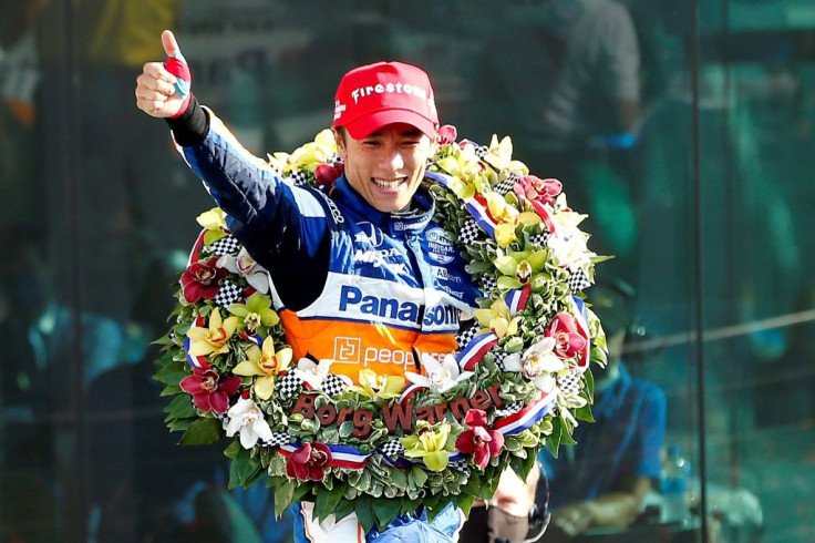 Two-time winner: Takuma Sato of Japan celebrates winning the 104th running of the Indianapolis 500 at Indianapolis Motor Speedway