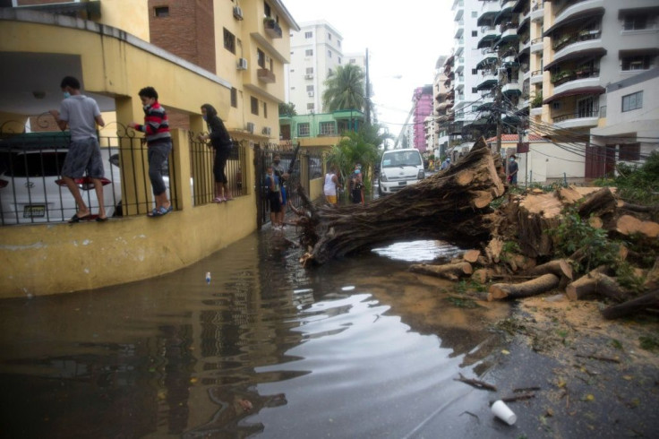 Tropical Storm Laura uprooted trees and flooded streets in the capital Santo Domingo when it hit the Dominican Republic