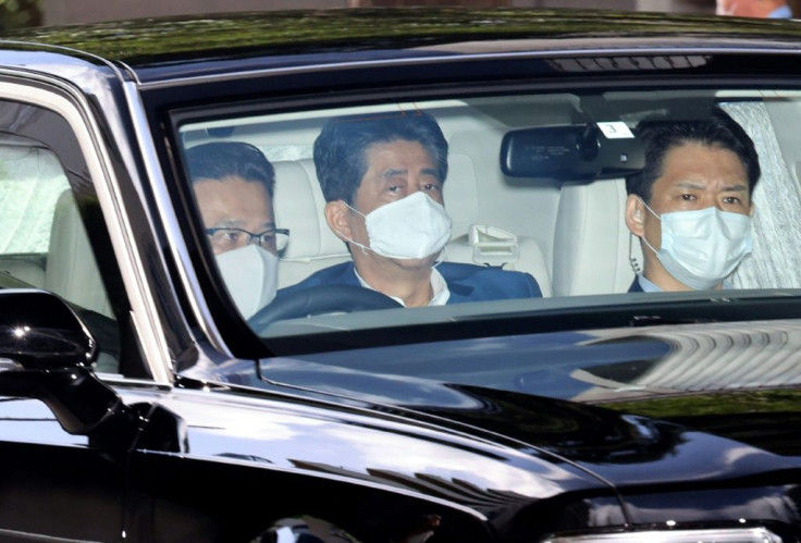 Japan's Prime Minister Shinzo Abe was back in hospital for additional tests a week after a surprise visit that sparked speculation about his health