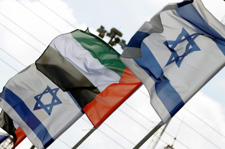 Israeli and United Arab Emirates flags shown lining a road in the Israeli coastal city of Netanya on August 16