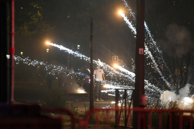 Police used tear gas to try and disperse the rioting fans