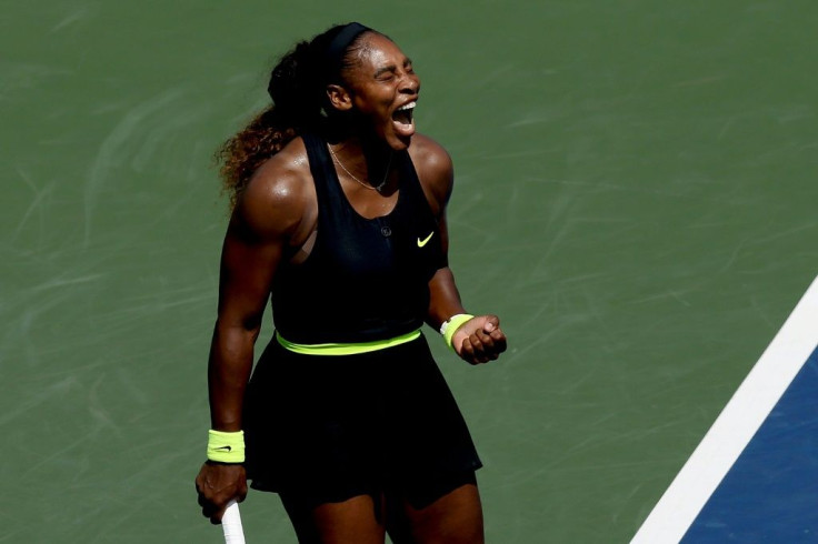 American Serena Williams celebrates a point in a hard-fought second-round win over Dutch qualifier Arantxa Rus at the Western & Southern Open in New York
