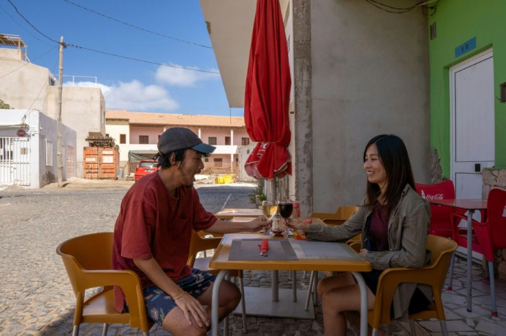 Rikiya (L) and Ayumi Kataoka (R) started a round-the-world trip in December in South Africa, and were working their way north in February when the scale of the coronavirus pandemic started to become clear