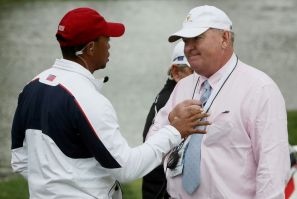 Andy McFee discusses a ruling with Tiger Woods during the 2017 Presidents Cup at Liberty National Golf Club in New Jersey