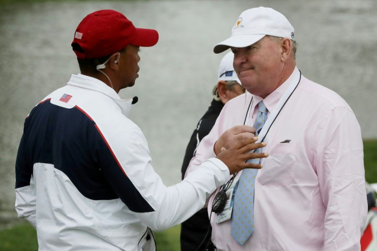 Andy McFee discusses a ruling with Tiger Woods during the 2017 Presidents Cup at Liberty National Golf Club in New Jersey