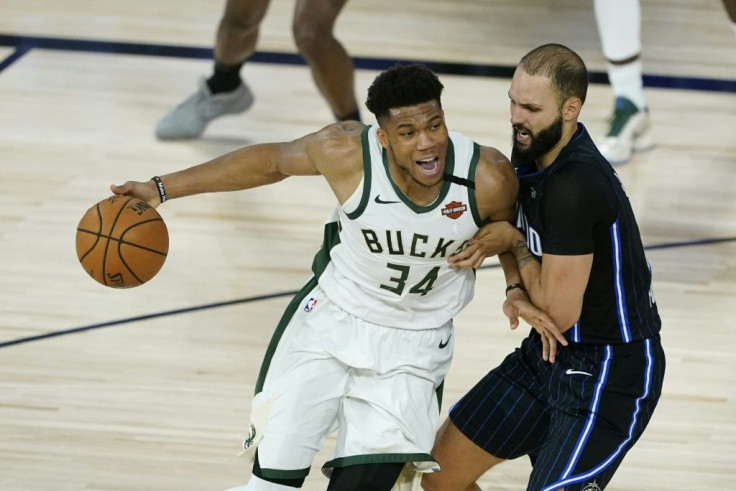 Milwaukee's Giannis Antetokounmpo drives past Orlando's Evan Fournier in the Bucks' 121-106 NBA playoff victory over the Magic