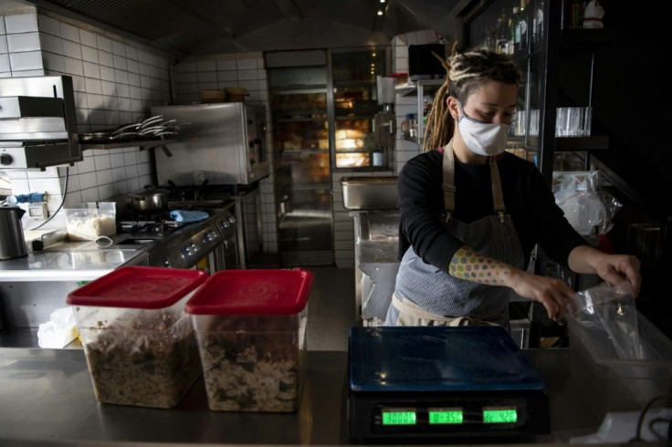 Chilean chef Carolina Bazan cooks meals to be vacuum sealed, at her Santiago eatery