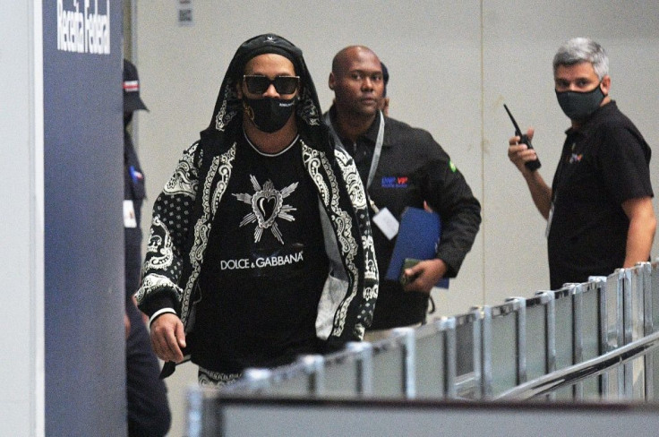 Former football star Ronaldinho arives at El Galeao airport in Rio de Janeiro, Brazil