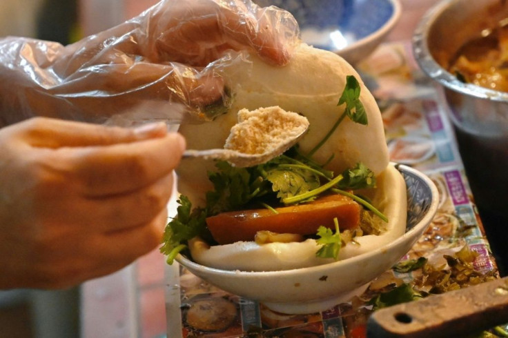 Known in Taiwanese as ho-ga-ti (tiger bites pig), the gua-bao is a circular flat steamed bun, which is folded in half and stuffed with braised meat, salted vegetables, coriander and ground peanuts