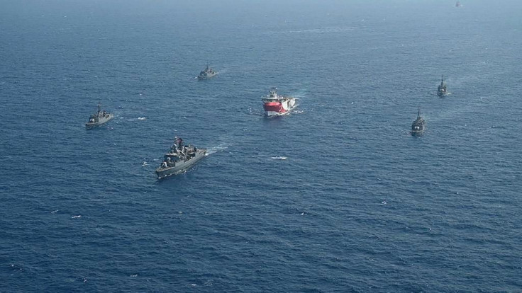 Photo from the Turkish navy showing the research ship Oruc Reis escorted by Turkish warships off the port of Antalya earlier this month