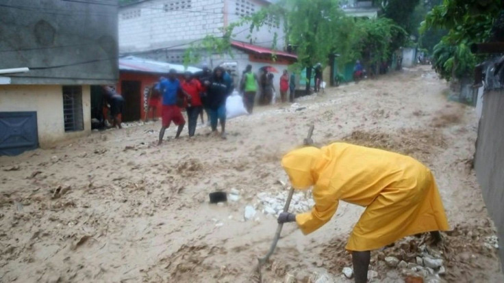 The flooded streets of Haiti's capital, Port-au-Prince, following the passage of Storm Laura