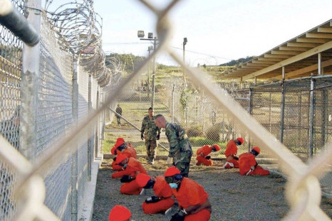 File photo of detainees sitting at Naval Base Guantanamo Bay