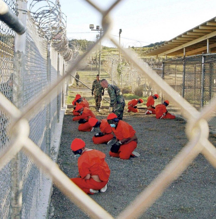 File photo of detainees sitting at Naval Base Guantanamo Bay