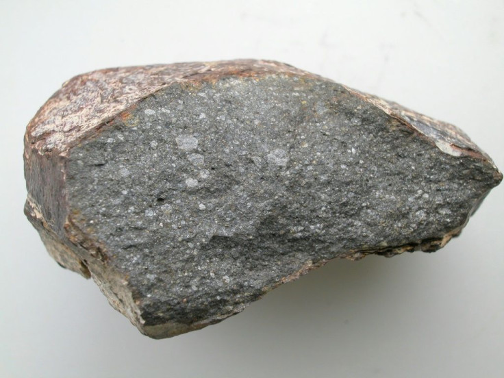 A piece of the meteorite Sahara 97096 (about 10 cm long), an enstatite chondrite