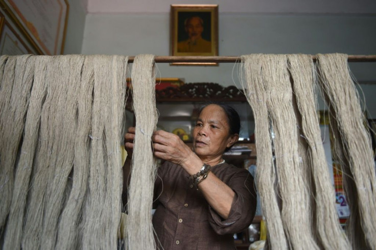 The "silk" is harvested from the fibrous pith in lotus stems, which would otherwise be left to rot in the field