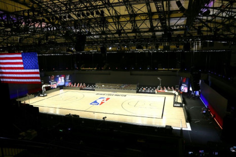A basketball court stands empty in Orlando after the NBA postponed games for a second straight day following Milwaukee's boycott