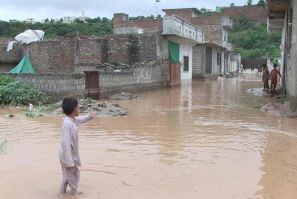 Water submerged streets and washed into houses in Rawalpindi city, next to the capital, after heavy rain caused rivers to overflow. Large swathes of Pakistan have been hit by flooding in recent weeks