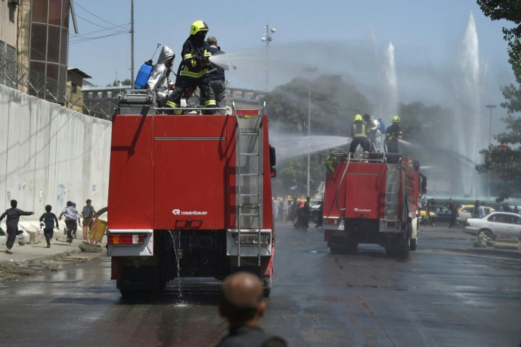Firefighters spray disinfectant on a street as a preventive measure against the spread of COVID-19 in Kabul. More than 38,000 cases of coronavirus have been declared in Afghanistan and more than 1,400 deaths