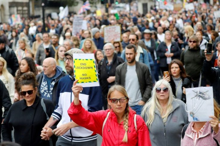 Protesters marched down Whitehall in central London to "expose the truth about Covid and lockdown"