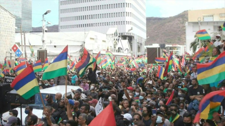 Tens of thousands of Mauritians take to the streets of Port-Louis to protest the government's handling of the oil spill that ravaged the southeast coast of Mauritius
