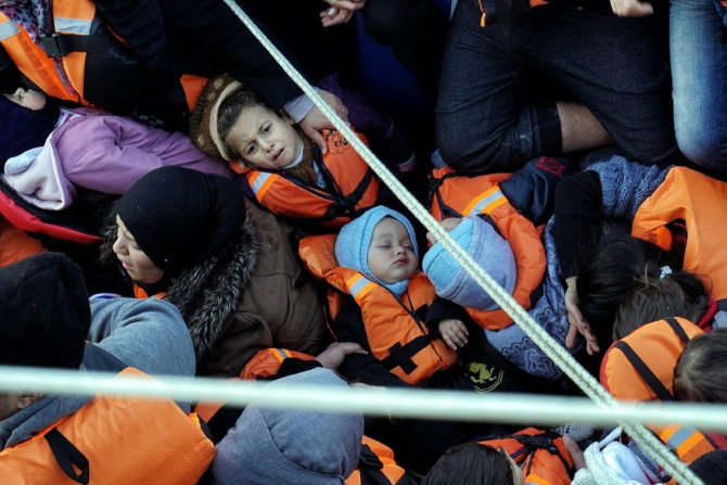 Greek coast guards rescue migrants as they try to reach the island of Lesbos by sea in February 2016 at the height of Europe's worst immigration crisis since WWII