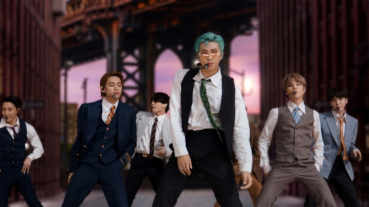 South Korean boy band BTS performing from South Korea during the 2020 MTV Video Music Awards, with iconic New York scenes in the background