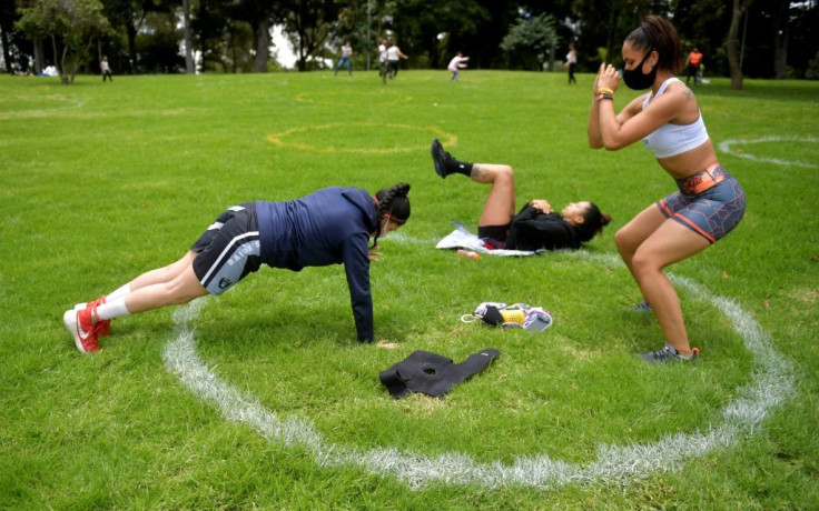 Locals enjoy the reopening of parks in Bogota, following the easing of lockdown measures by the city mayor and the Colombian government