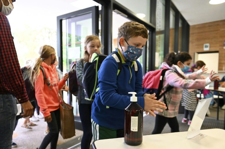 Students were masked as they headed back to class in Strasbourg, eastern France