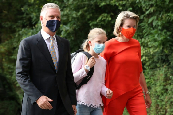 King Philippe of Belgium and his wife Mathilde, accompany their daughter Eleonore to school