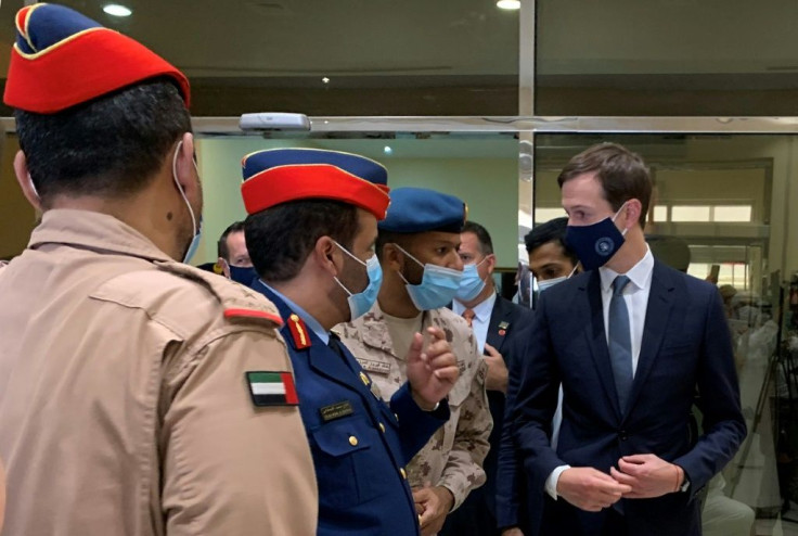 US Presidential Adviser Jared Kushner (R) speaks to Emirati military personnel during a visit to the Al-Dhafra base, south of Abu Dhabi