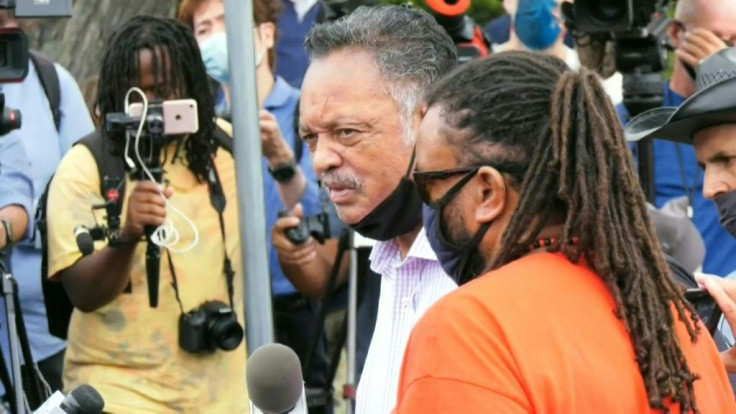 Reverend Jesse Jackson joins protest in Kenosha on day of Donald Trump's visit